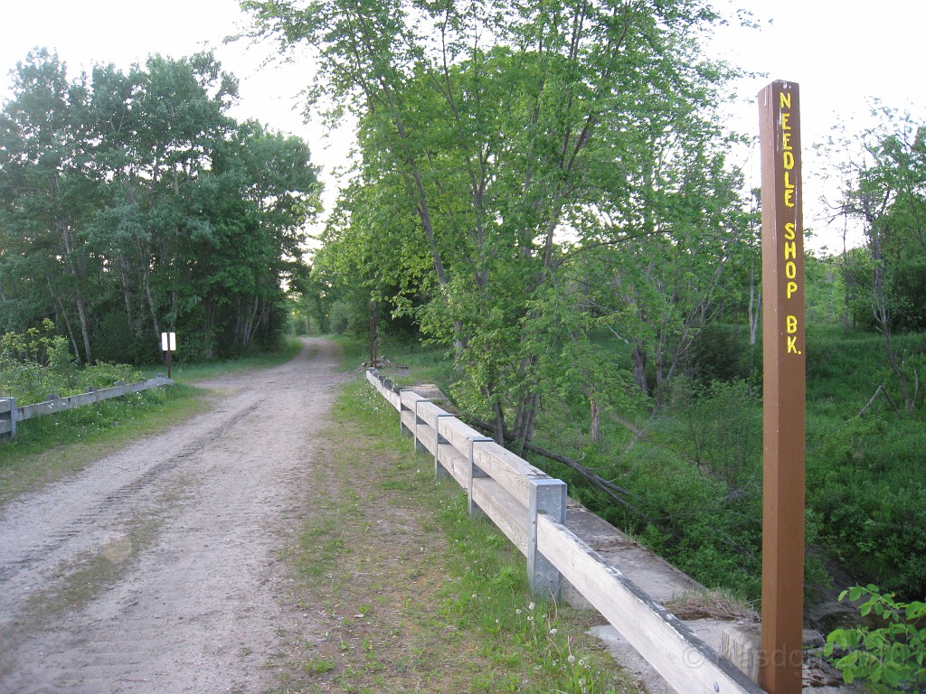 Old Hill Village - South End 435.jpg - In February 1937, residents of Hill Village NH learned that their village, near the Pemigewasset River, was to become a flood control reservoir for the Franklin Falls dam project. To accommodate the construction of the Franklin Falls Dam, the village of Hill NH was to be relocated. By January of 1940, the citizens of Hill NH formed an association, purchased land, and began planning a new model village with the help of the NH State Planning and Development Commission. Construction started in 1940, and by June of 1941 the new town hall and school were completed, along with the streets, water system, and 30 houses. The 1941 town meeting was called to order in the old town hall, recessed, and reconvened in the new village.